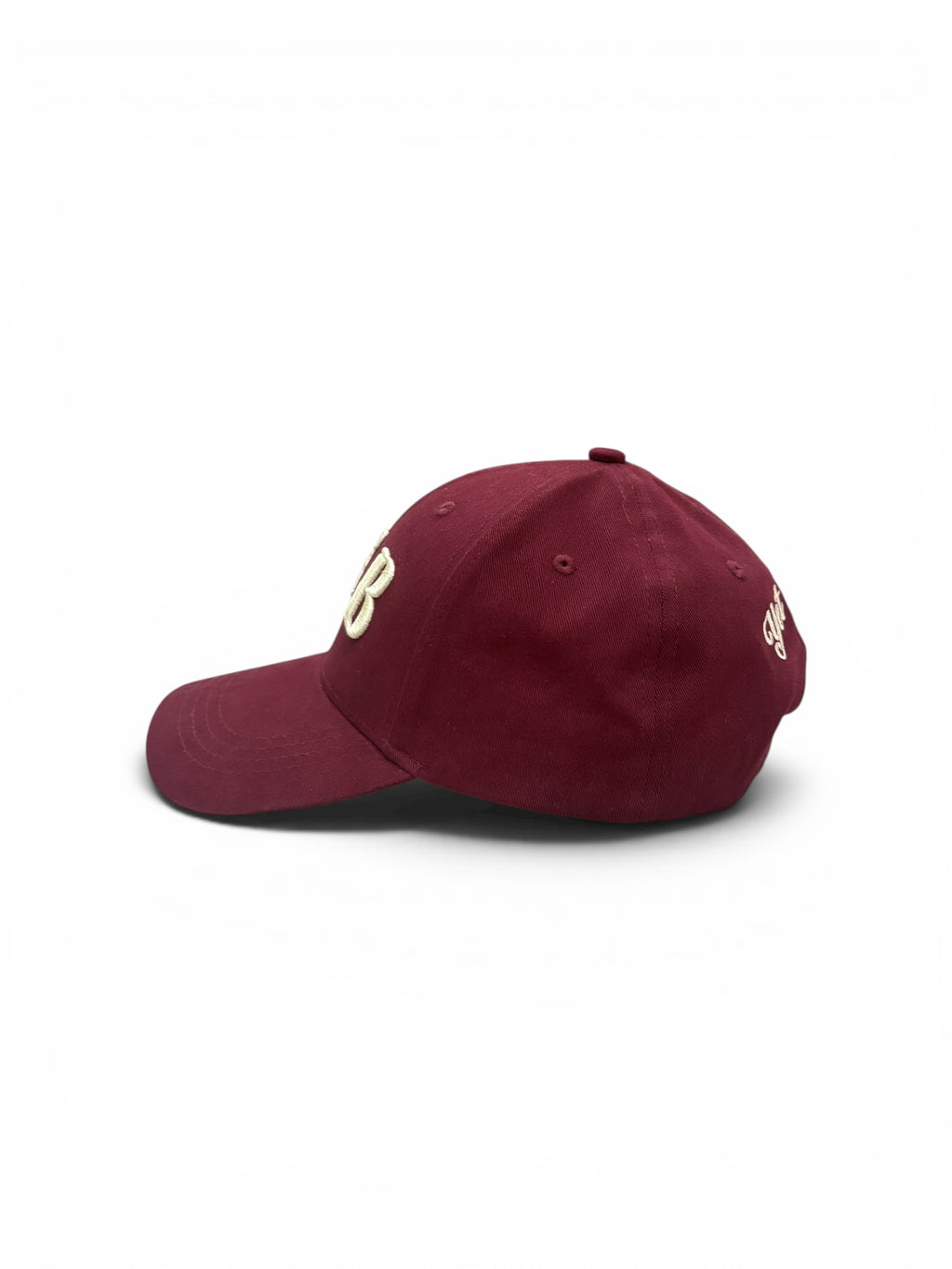 Maroon Yet To Be baseball cap, back three-quarter view, showing Yet To Be script embroidery