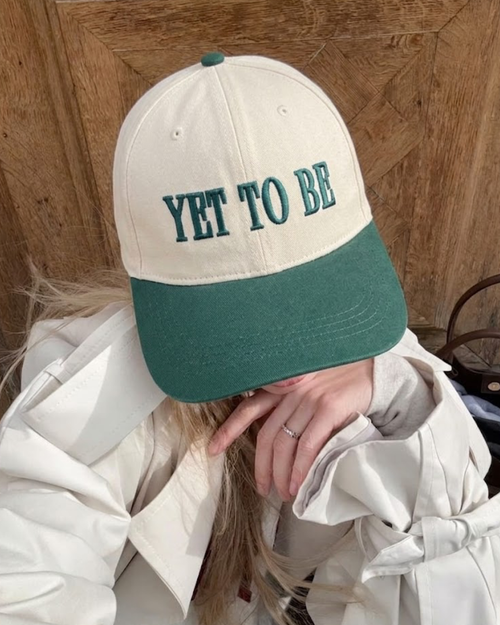 Green Yet To Be (YTB) streetwear cap, product flat lay