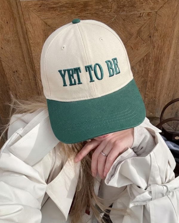 Green Yet To Be (YTB) streetwear cap, product flat lay